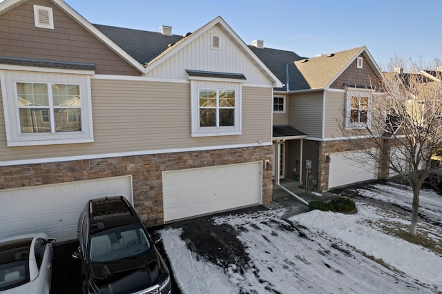 view of front of property with a garage