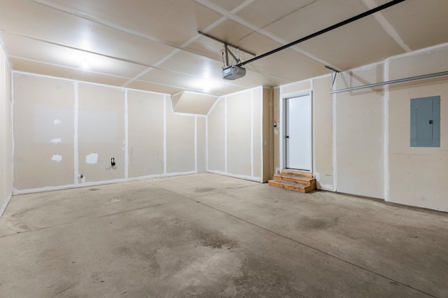 garage featuring a garage door opener and electric panel