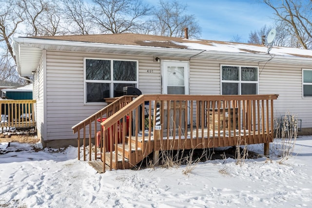 view of front of home with a wooden deck