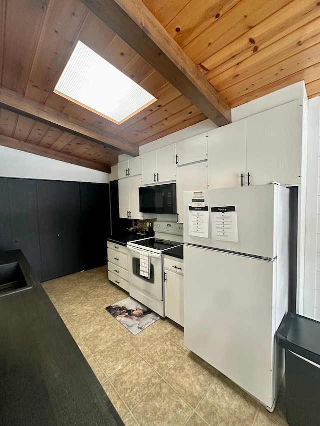 kitchen featuring a skylight, beamed ceiling, sink, white cabinets, and white appliances