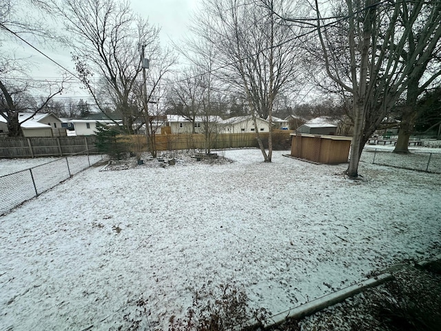 view of yard covered in snow