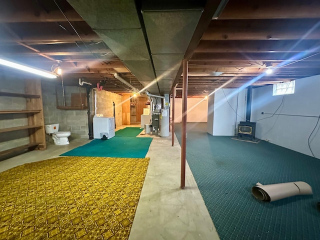 basement featuring a wood stove