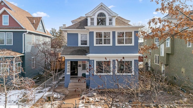 view of front of home with roof with shingles