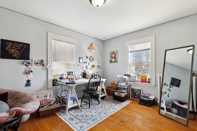 office with hardwood / wood-style flooring