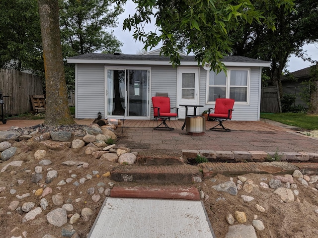 rear view of house featuring a patio