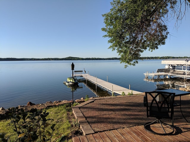 dock area featuring a water view