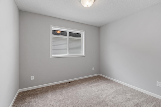 empty room with carpet floors