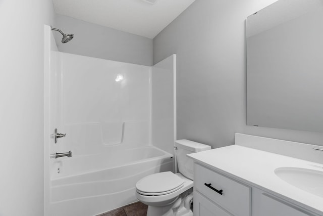 full bathroom featuring vanity, tile patterned flooring,  shower combination, and toilet