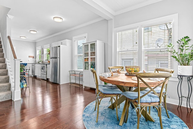 dining room with baseboards, stairway, dark wood finished floors, and crown molding