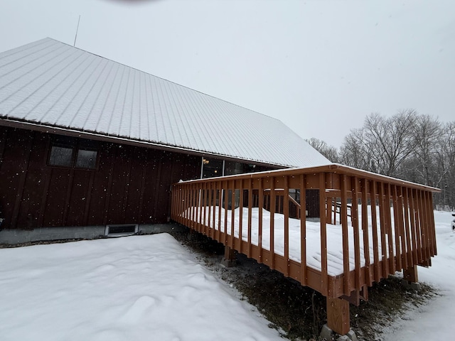 view of snow covered deck