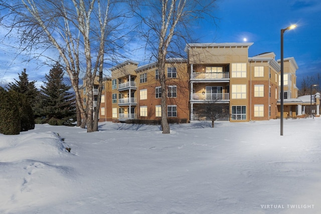 view of snow covered property