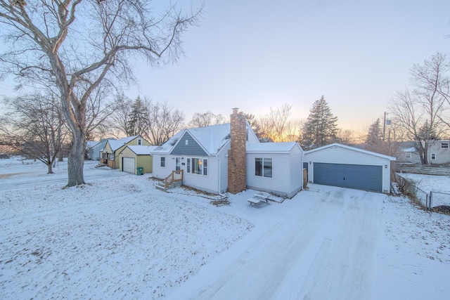 view of front of home with an outbuilding and a garage