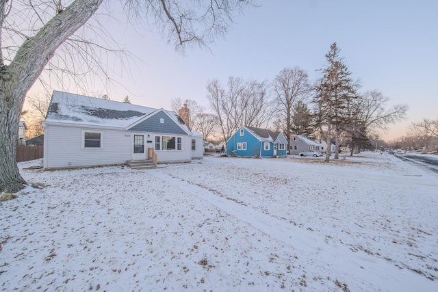 view of snow covered house