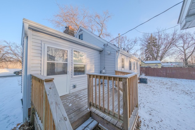 view of snow covered deck