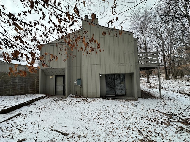 view of snow covered property