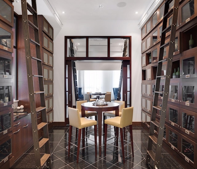 dining space with a high ceiling