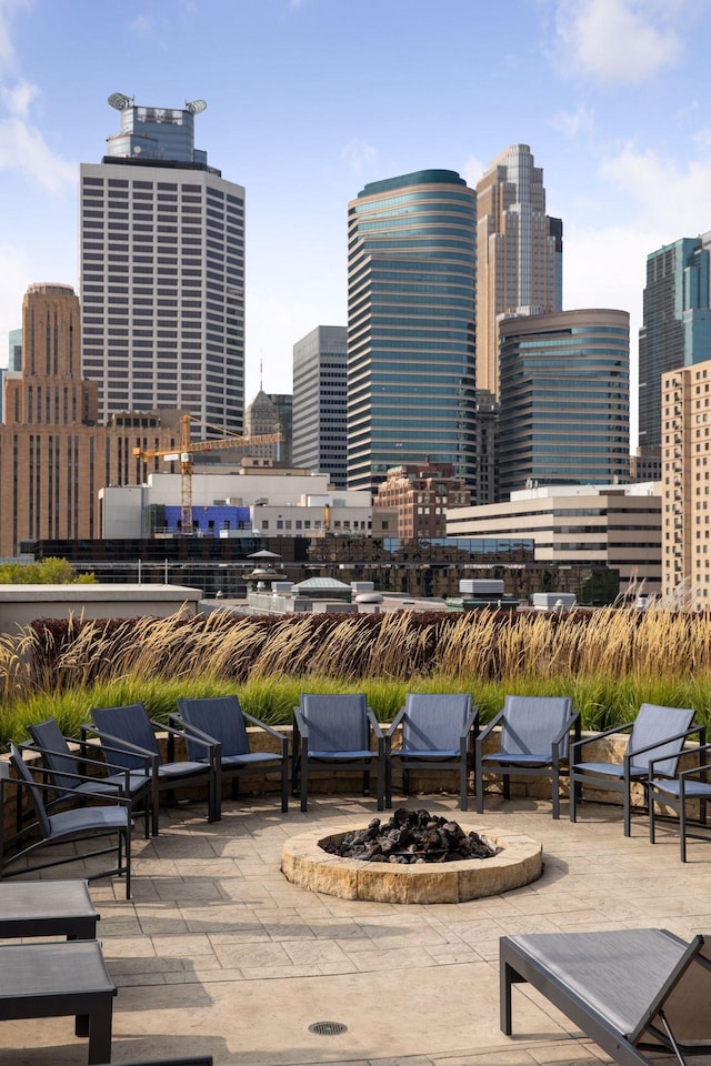 view of patio / terrace featuring a fire pit