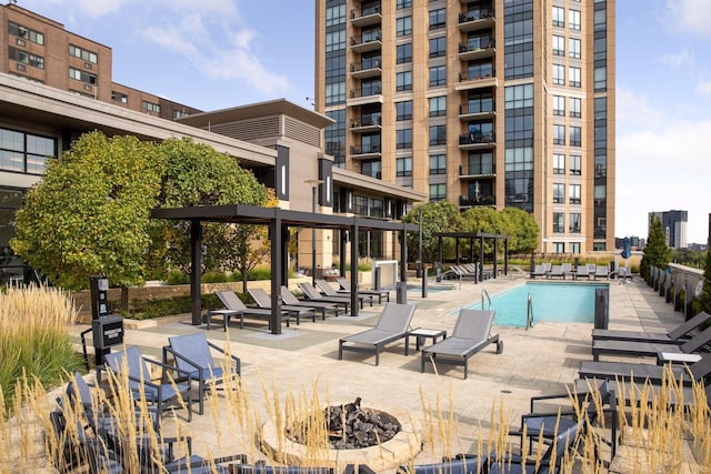 view of swimming pool with a patio area