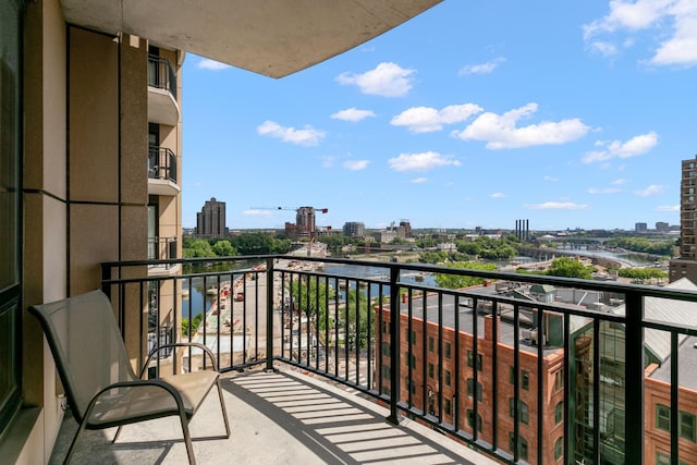 balcony featuring a water view