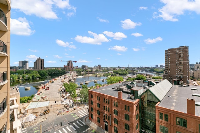 property's view of city featuring a water view