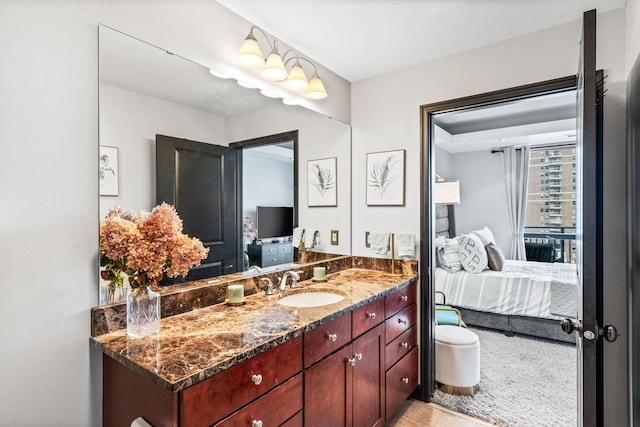 bathroom with vanity and tile patterned flooring