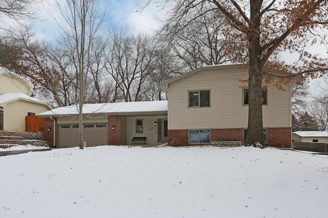 split level home featuring a garage