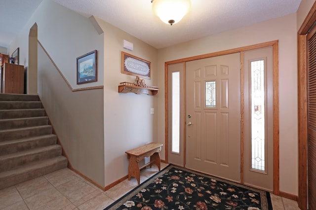 view of tiled foyer