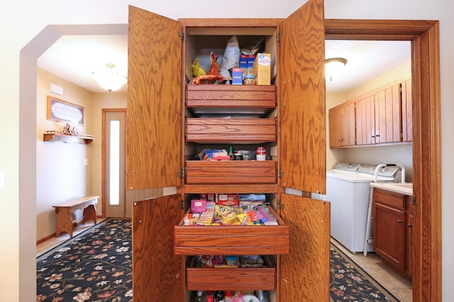 interior space with separate washer and dryer