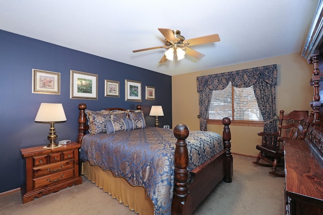 bedroom featuring light carpet and ceiling fan