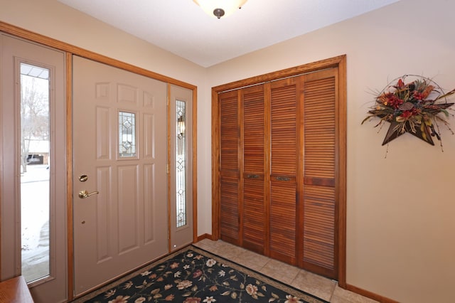 view of tiled foyer entrance