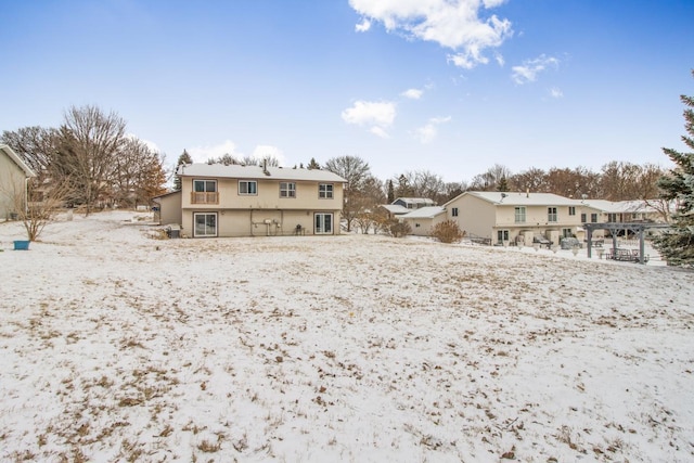 view of snow covered property