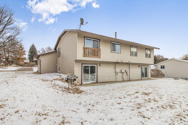 view of snow covered property