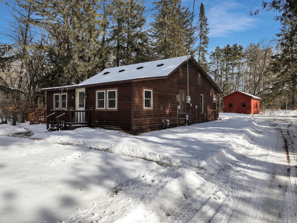 view of snow covered house
