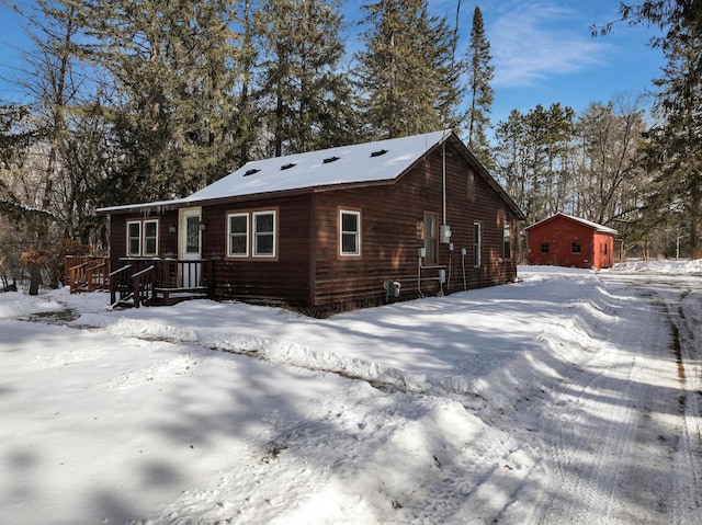 view of snow covered house