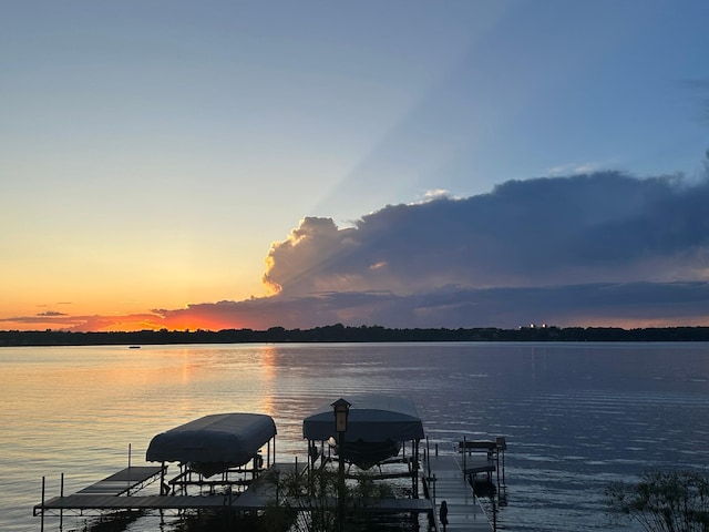 dock area featuring a water view