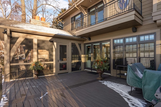 wooden terrace featuring grilling area