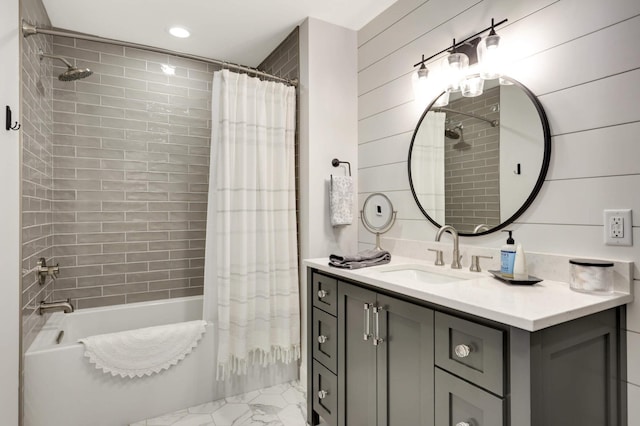 bathroom with shower / bath combo and vanity