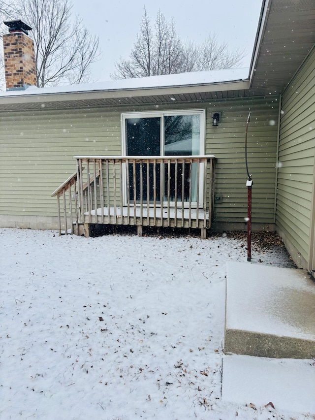 view of snow covered property