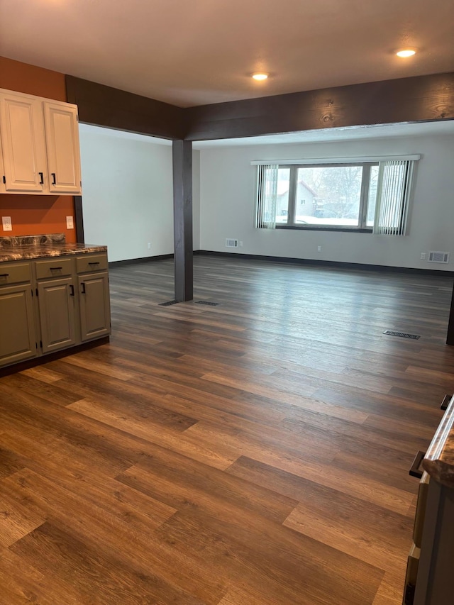 living room with dark hardwood / wood-style floors