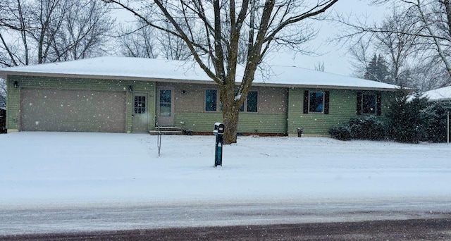 view of front of property featuring a garage