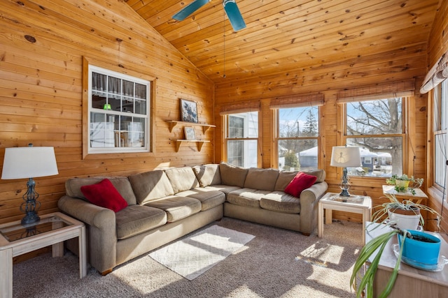 living room featuring lofted ceiling, carpet floors, wood ceiling, and wooden walls