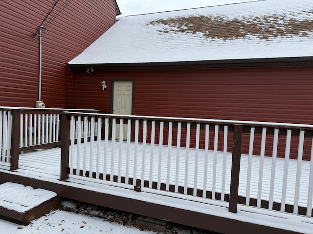 view of snow covered deck