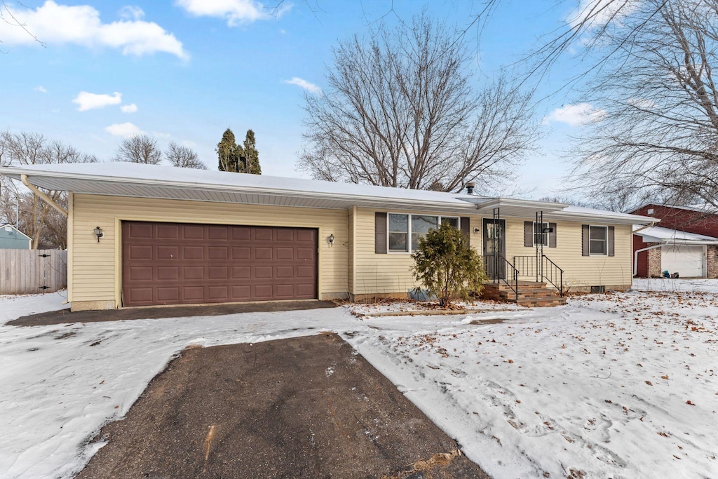 single story home with a garage