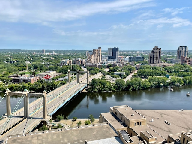 bird's eye view featuring a view of city and a water view