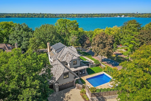 drone / aerial view with a water view