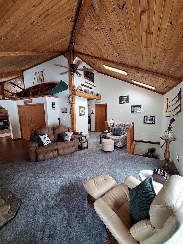 carpeted living area with high vaulted ceiling, beamed ceiling, wood ceiling, and a ceiling fan