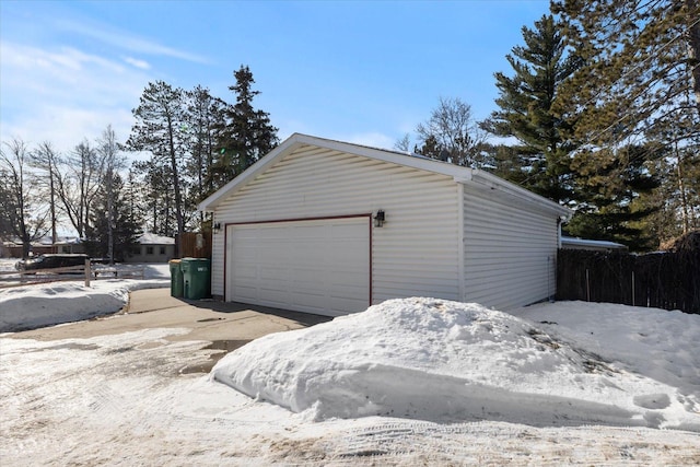 view of snow covered garage