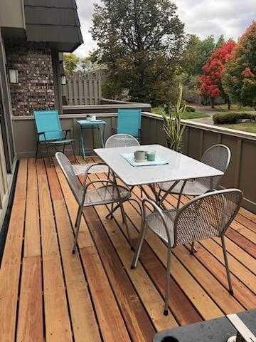 wooden deck with outdoor dining space