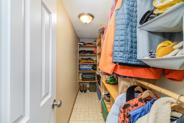 walk in closet featuring tile patterned floors