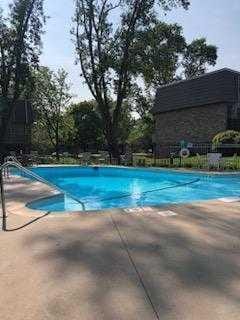 pool featuring a patio area